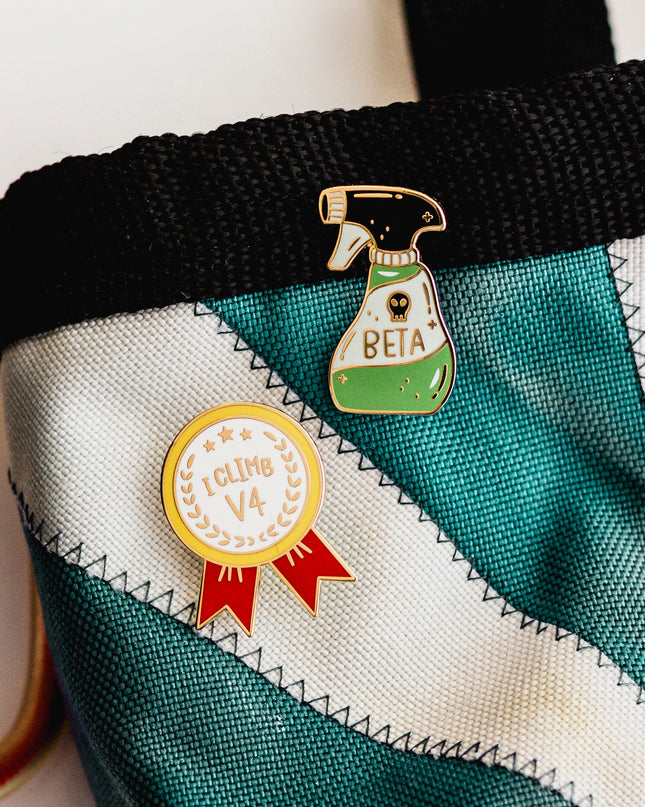 Beta Spray Enamel Pin