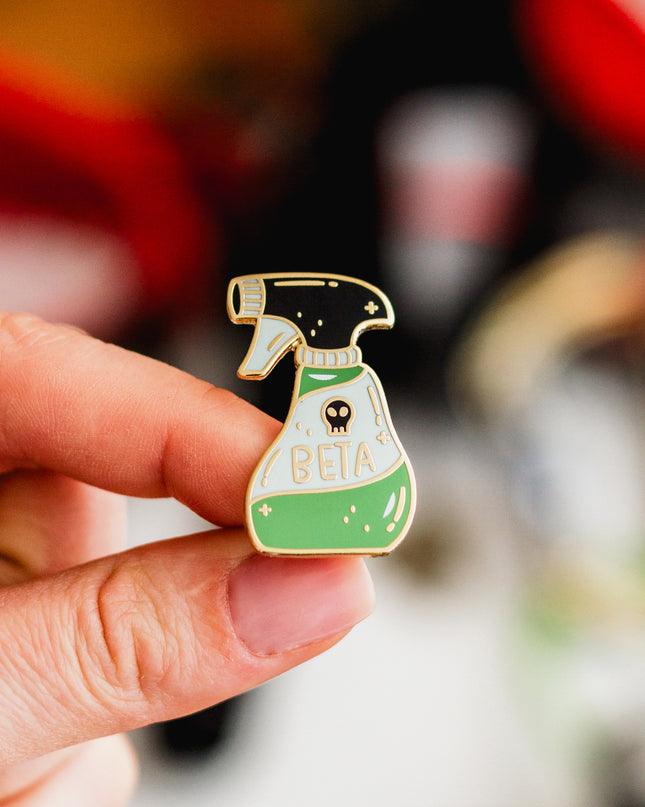 Beta Spray Enamel Pin
