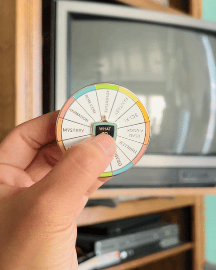 What To Watch Spinning Enamel Pin