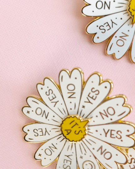 Spinning Daisy Enamel Pin