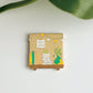 Cozy Corner Enamel Pin